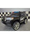 Elektrisk Toyota Land Cruiser politi til 2 børn 24V med gummihjul og lædersæder H58 x L125 x B73 cm - Sort/Hvid