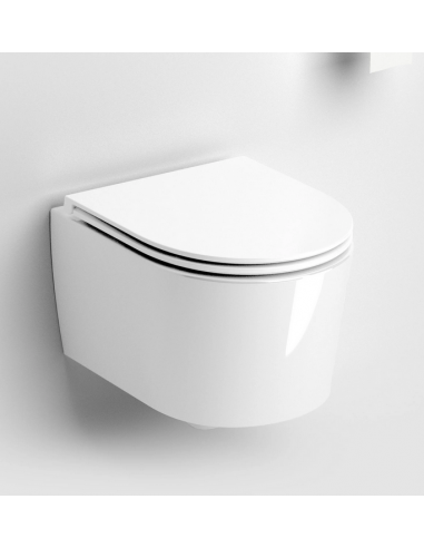 væghængt toilet hvidt mat blank skinnende badeværelse indretning design