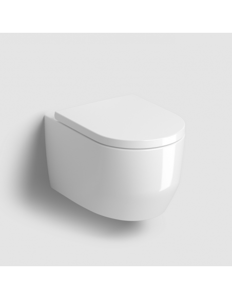 væghængt toilet hvidt mat blank skinnende badeværelse indretning design