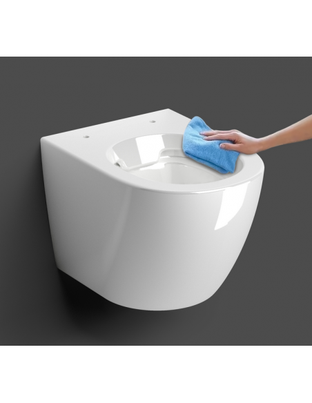 væghængt toilet hvidt mat blank skinnende badeværelse indretning design