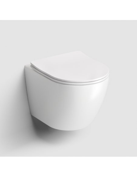 væghængt toilet hvidt mat blank skinnende badeværelse indretning design