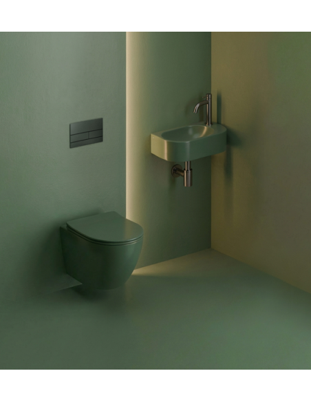 væghængt toilet grøn mat blank skinnende badeværelse indretning design